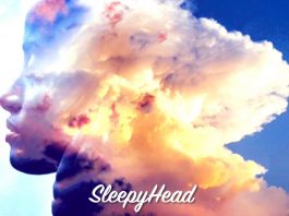 Head of a person with closed eyes in Clouds