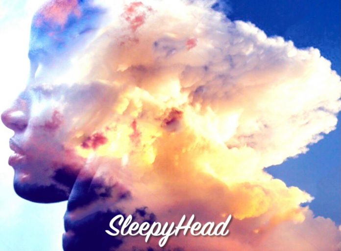 Head of a person with closed eyes in Clouds